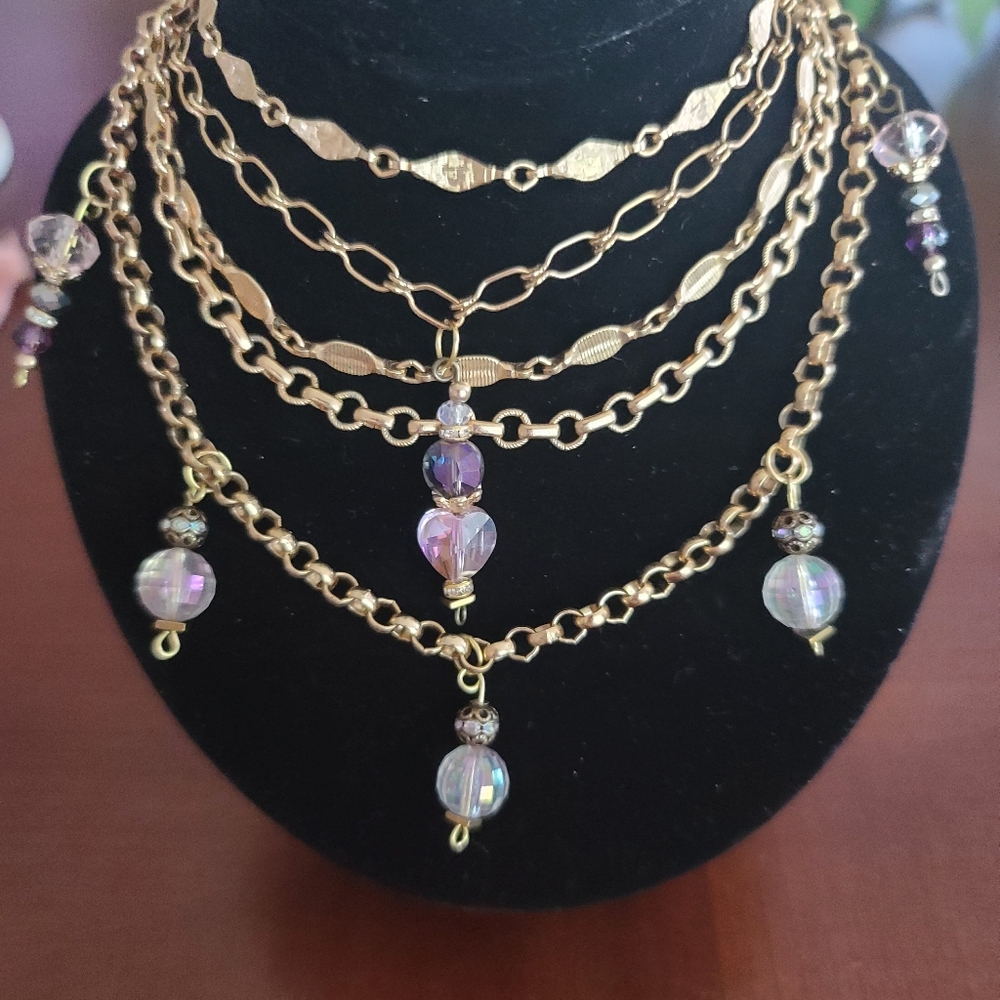 Gold tone irredecent necklace